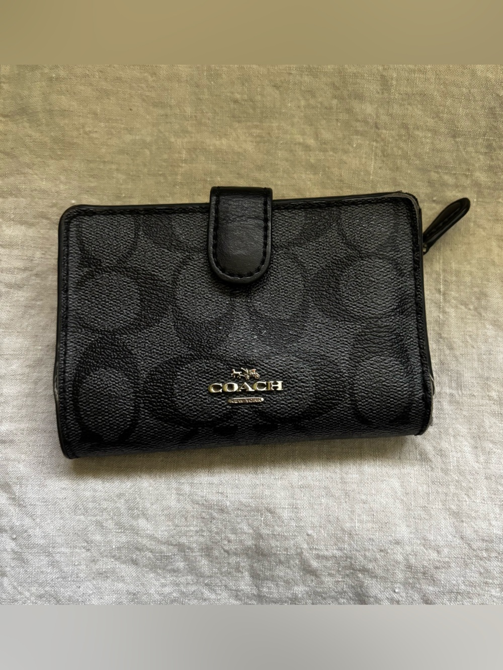 Coach Black Signature Canvas Compact Wallet gold Logo, fair/heavily used